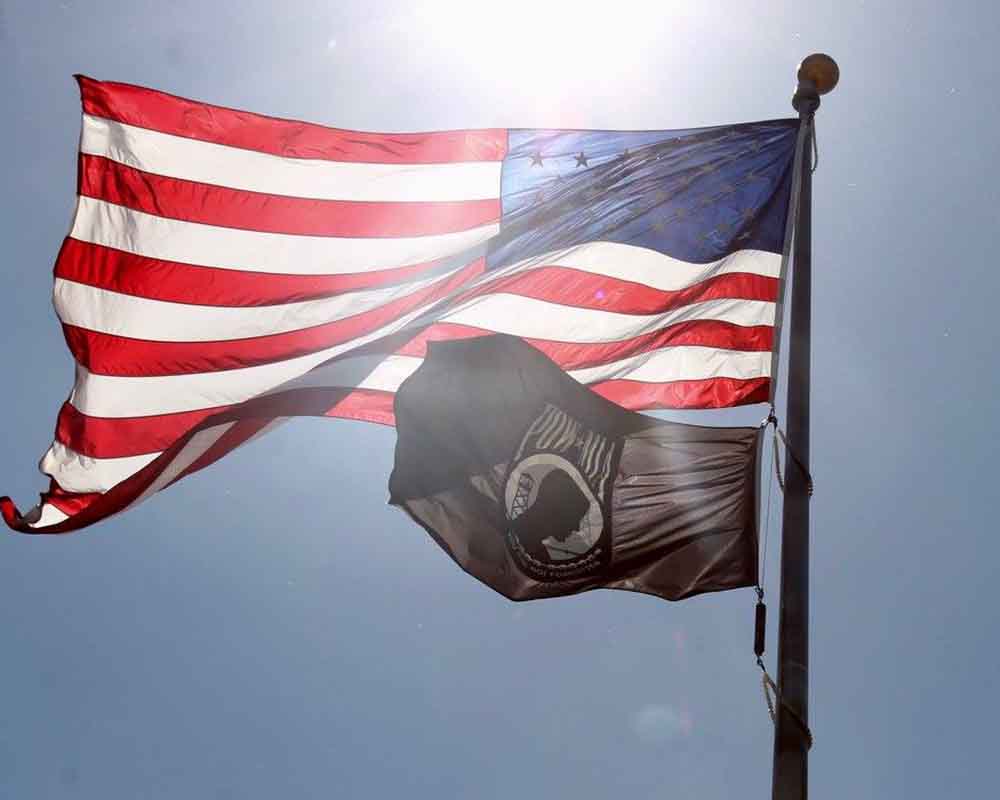 US Flag and POW MIA flag at the memorial